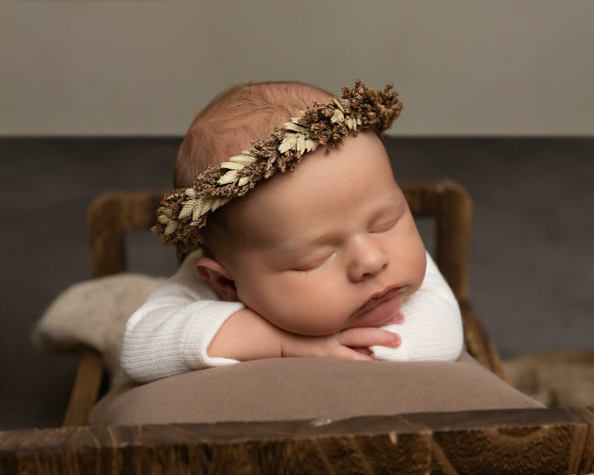 baby with flower crown