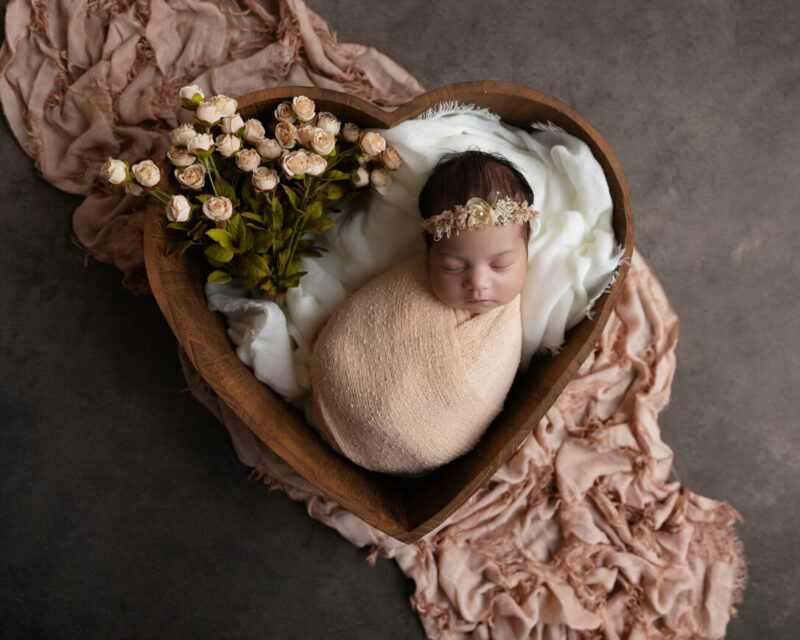 baby girl in heart box photo pinks and flowers