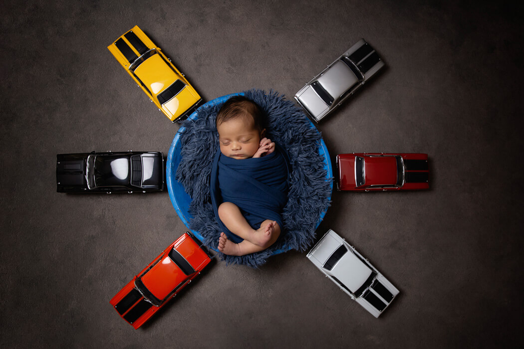 newborn phoshoot with cars